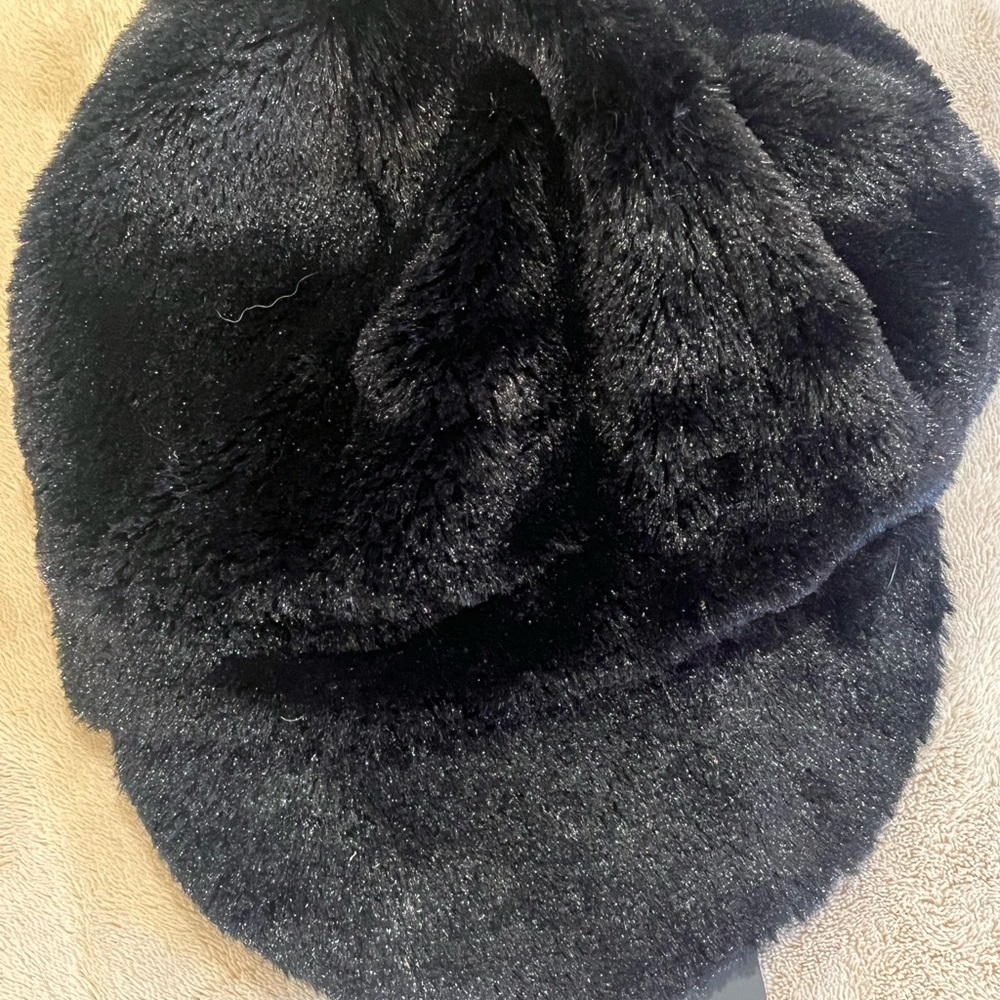 Donna Saylers fur cap for a child.